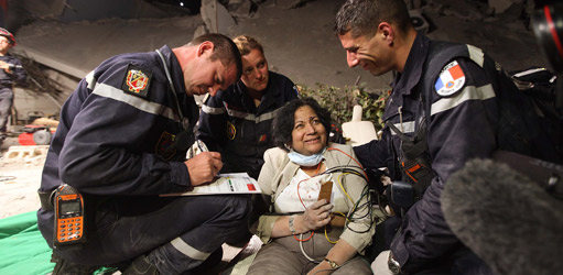 Dr. Chand after being pulled from the rubble.